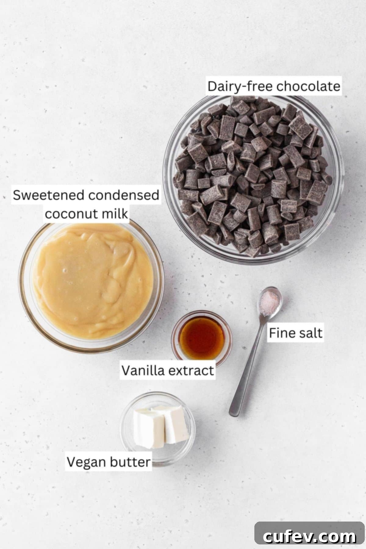 Ingredients for making dairy-free fudge measured out onto a white table with text overlay.