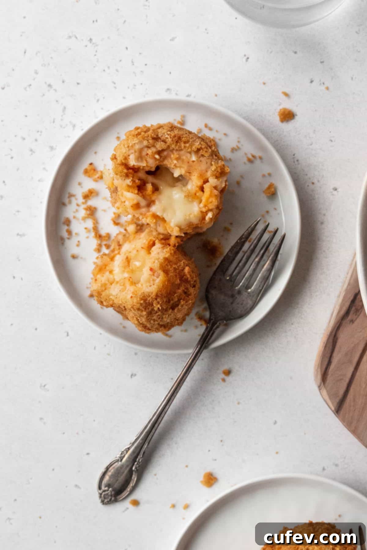 Closeup shot of the texture of a panko coated potato croquette.