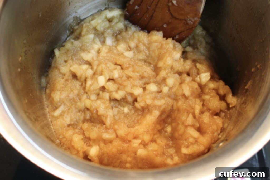 Delicious Homemade Apple Pie Doughnuts, warm and ready to be enjoyed during National Apple Month