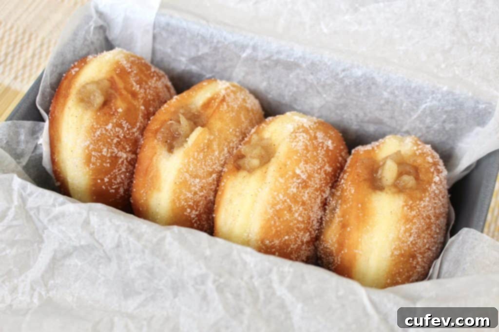 Dough in a bread machine, during the kneading cycle for homemade apple doughnuts