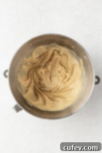 Coffee cake batter after combining wet and dry ingredients, smooth and ready for resting.