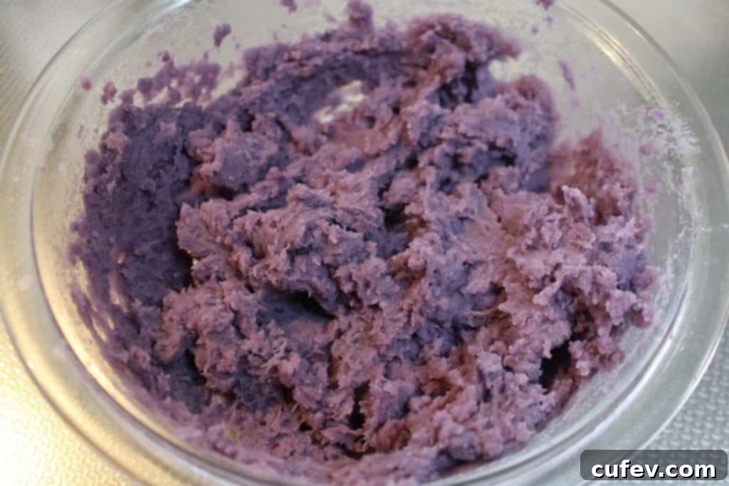 Creamy mashed purple sweet potatoes, ready to be formed into the core of Halloween white chocolate eyeballs