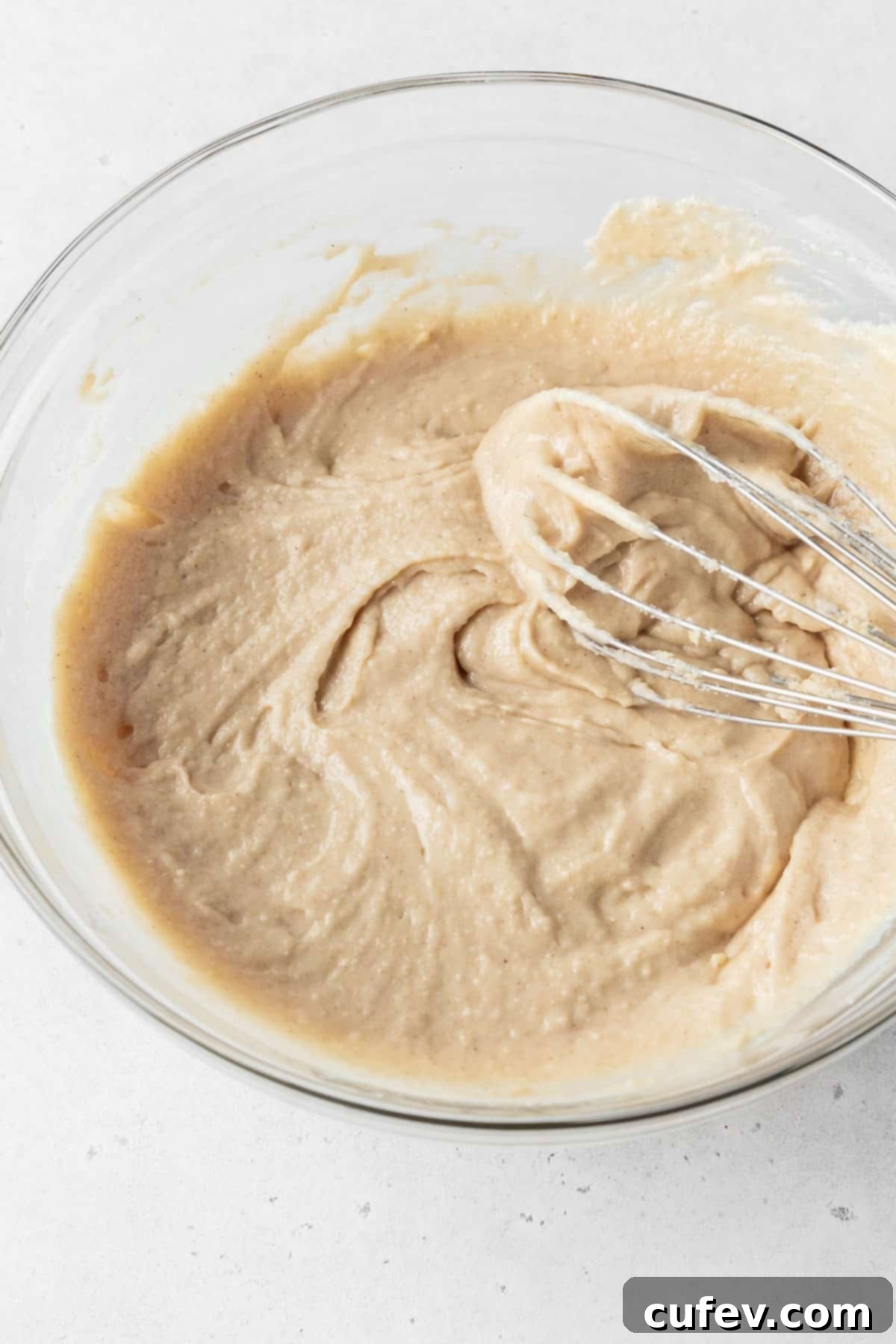 Dairy-free gluten-free vegan donut batter after adding liquid ingredients.