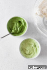 Two small ramekins with matcha frosting.