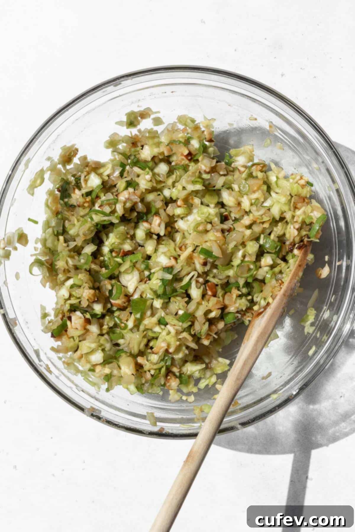Homogenized vegetarian dumpling filling in a large bowl, ready for wrapping.