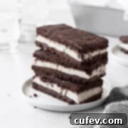 A stack of perfectly crafted gluten-free ice cream sandwiches on a small white plate, ready to be enjoyed.