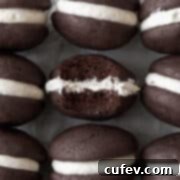 Gluten Free Whoopie Pies 4 An up-close shot of a gluten-free whoopie pie with a bite taken out of it.