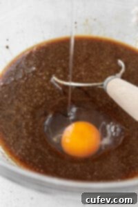 Gluten Free Whoopie Pies 5 Adding an egg to the gluten-free whoopie pie batter.