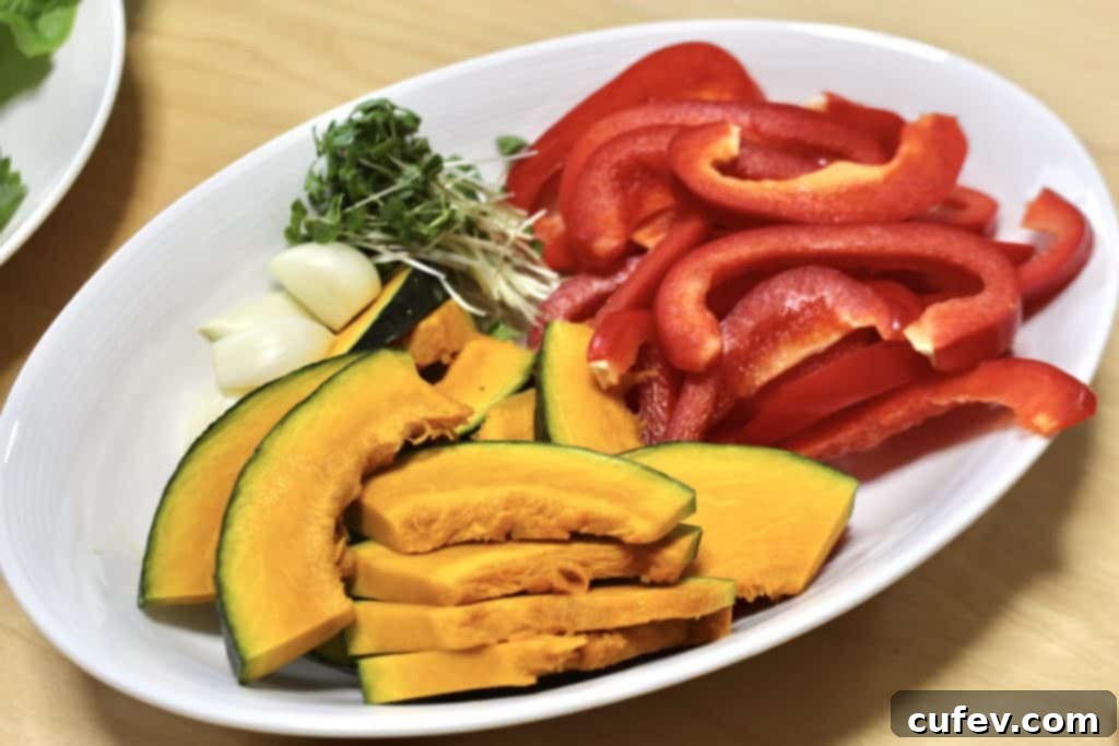 Close-up of fresh, vibrant lettuce and perilla leaves arranged for Samgyeopsal wraps