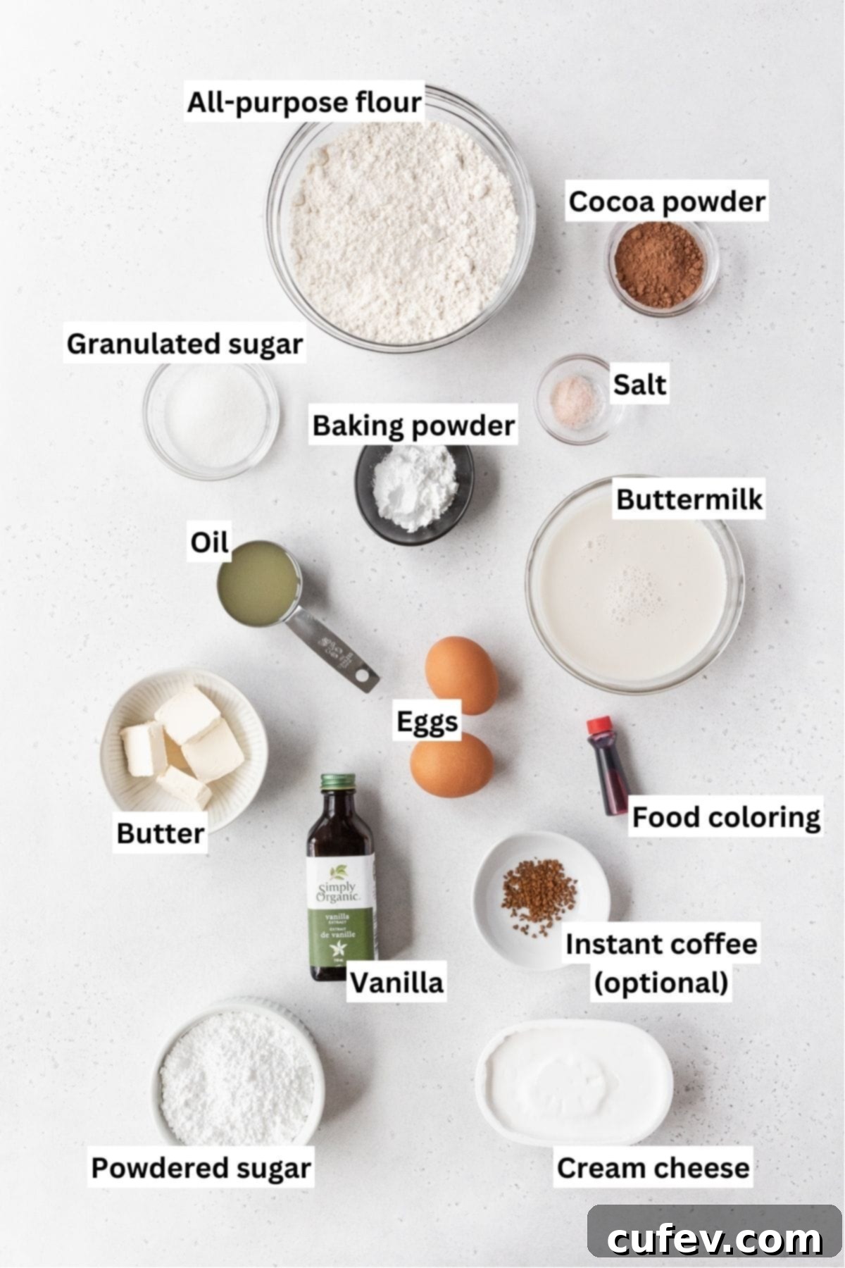 All of the ingredients for the red velvet waffles on a white counter.