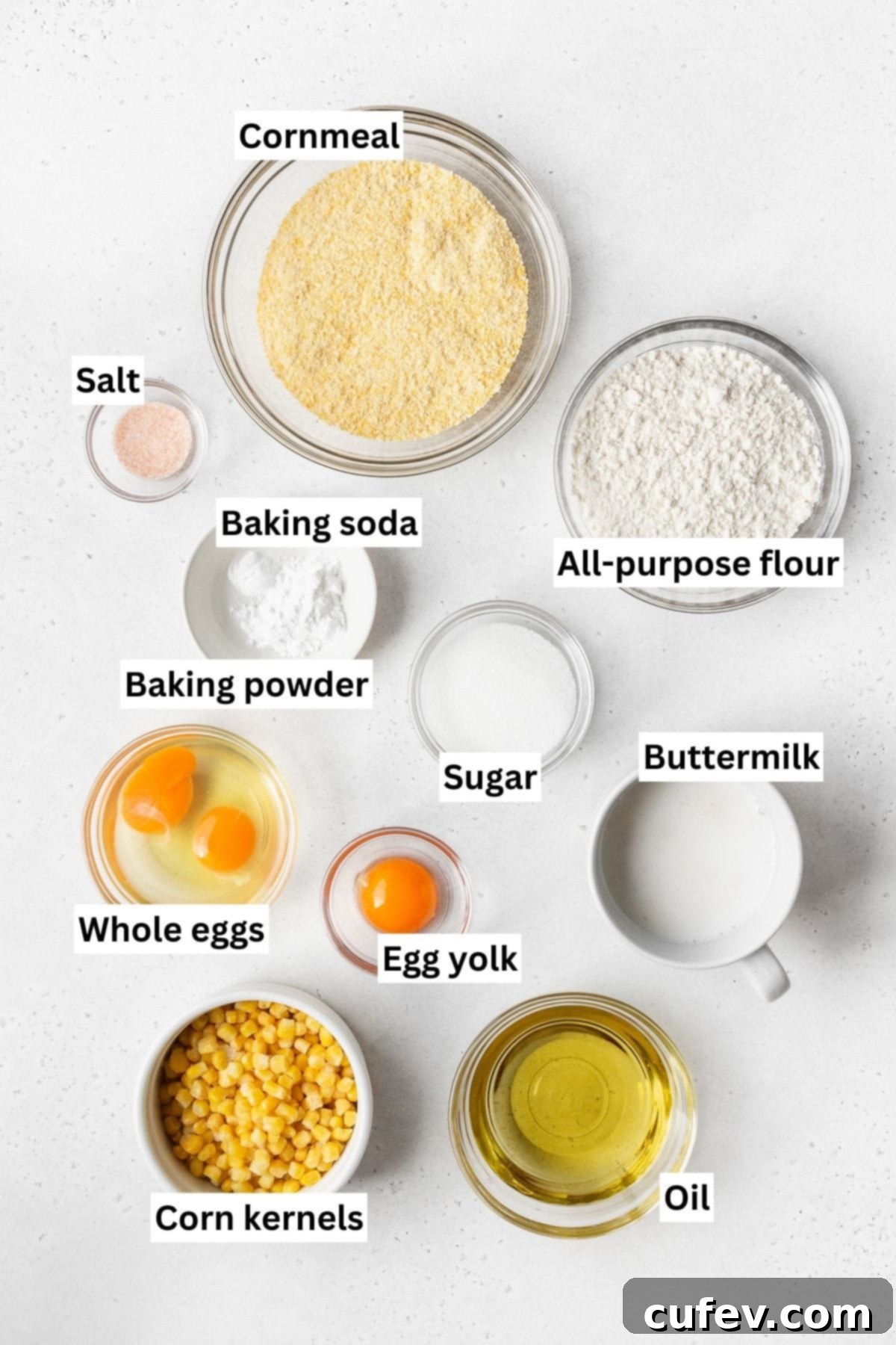 All the essential ingredients for making the cornbread croutons, neatly laid out on a kitchen counter, ready for preparation.