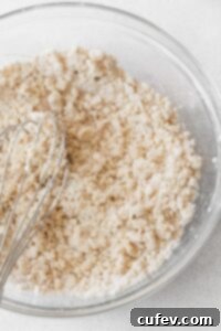 Tropical Gluten-Free Pineapple Upside Down Dream 8 A bowl of pineapple upside down cake dry ingredients with the butter worked into it.