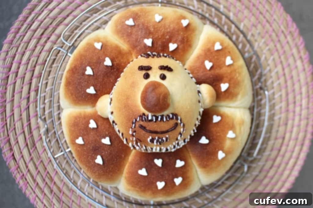 The final decorated blueberry cream cheese buns, with the 'dad' face bun, ready for celebration.