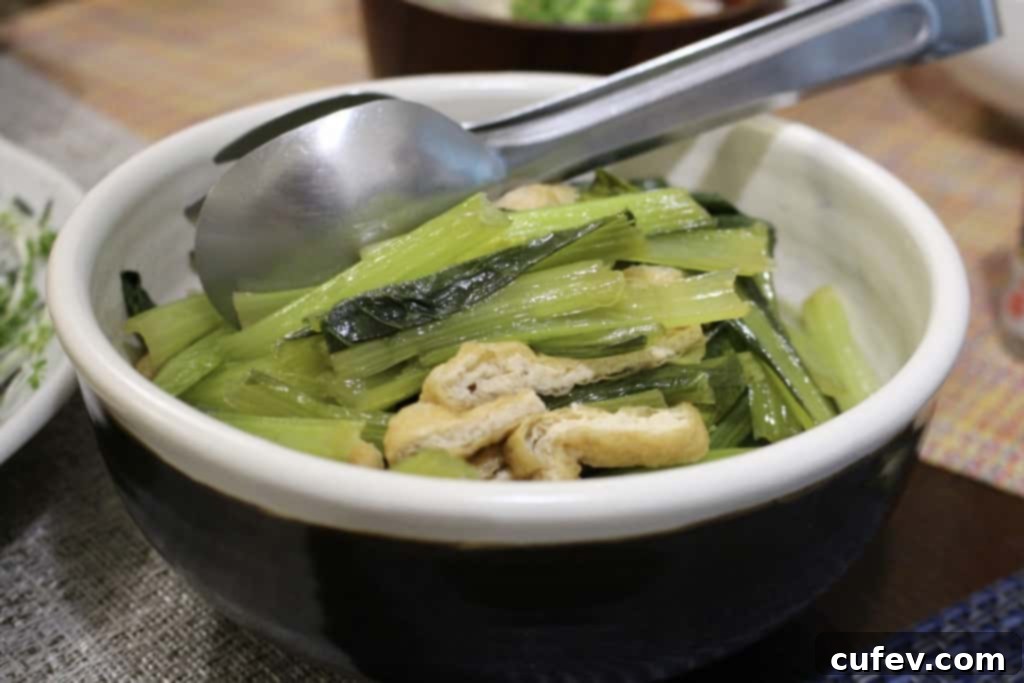 Stewed Japanese mustard spinach and aburaage, a healthy and flavorful side dish.