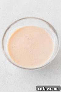 Bang bang shrimp sauce mixed together in a glass bowl.