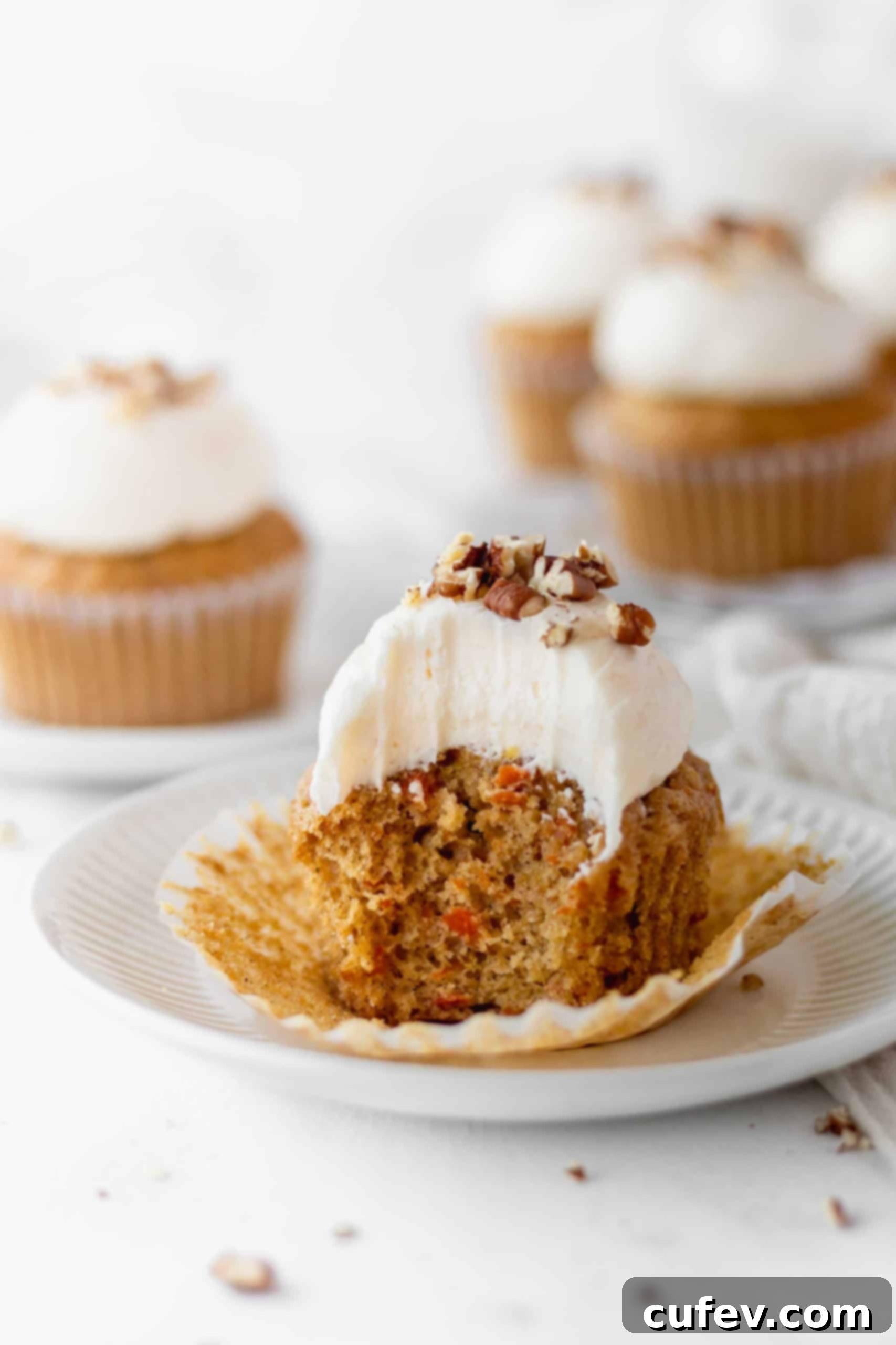 A cupcake with a bite taken out