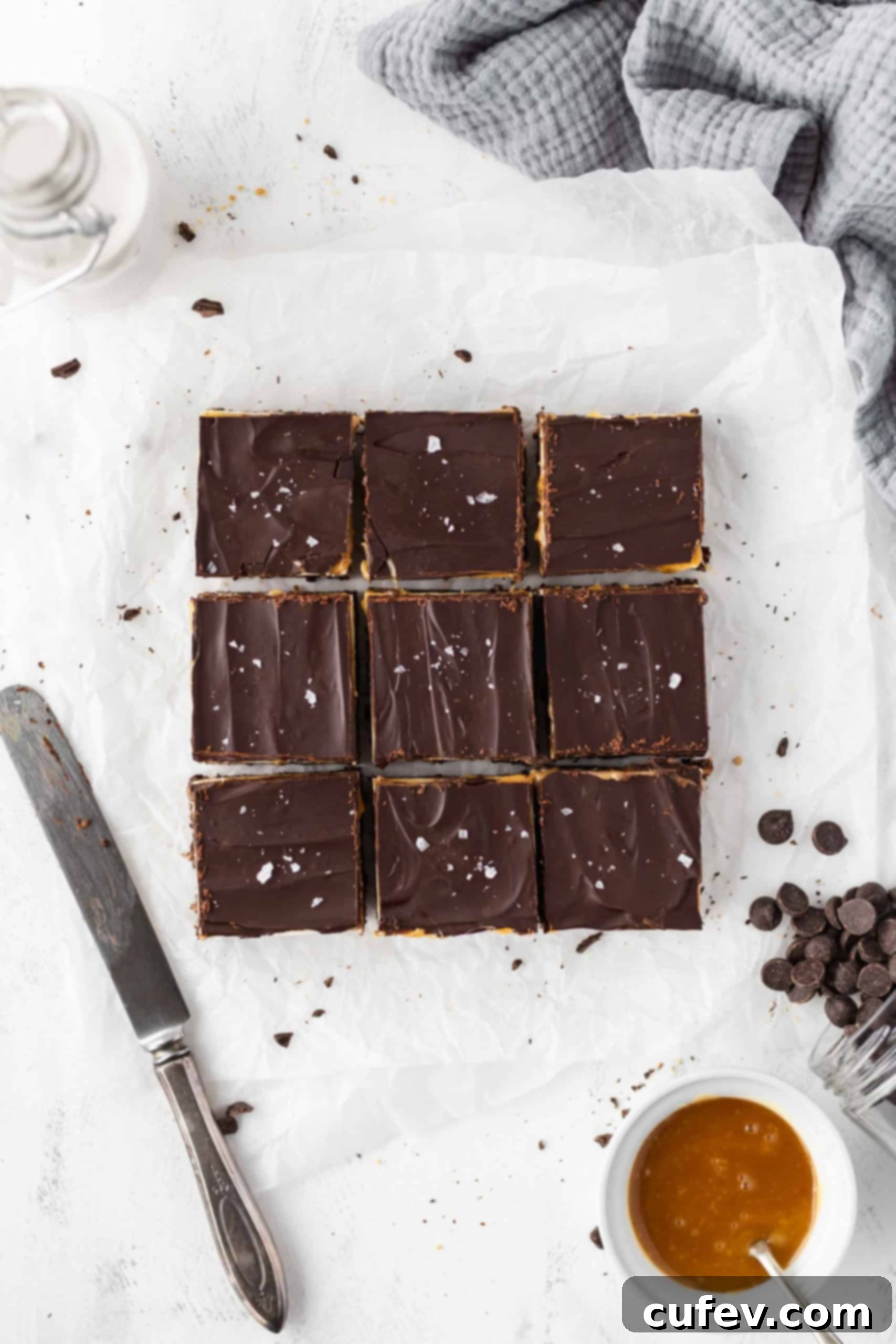 Gluten free Nanaimo bars with a knife