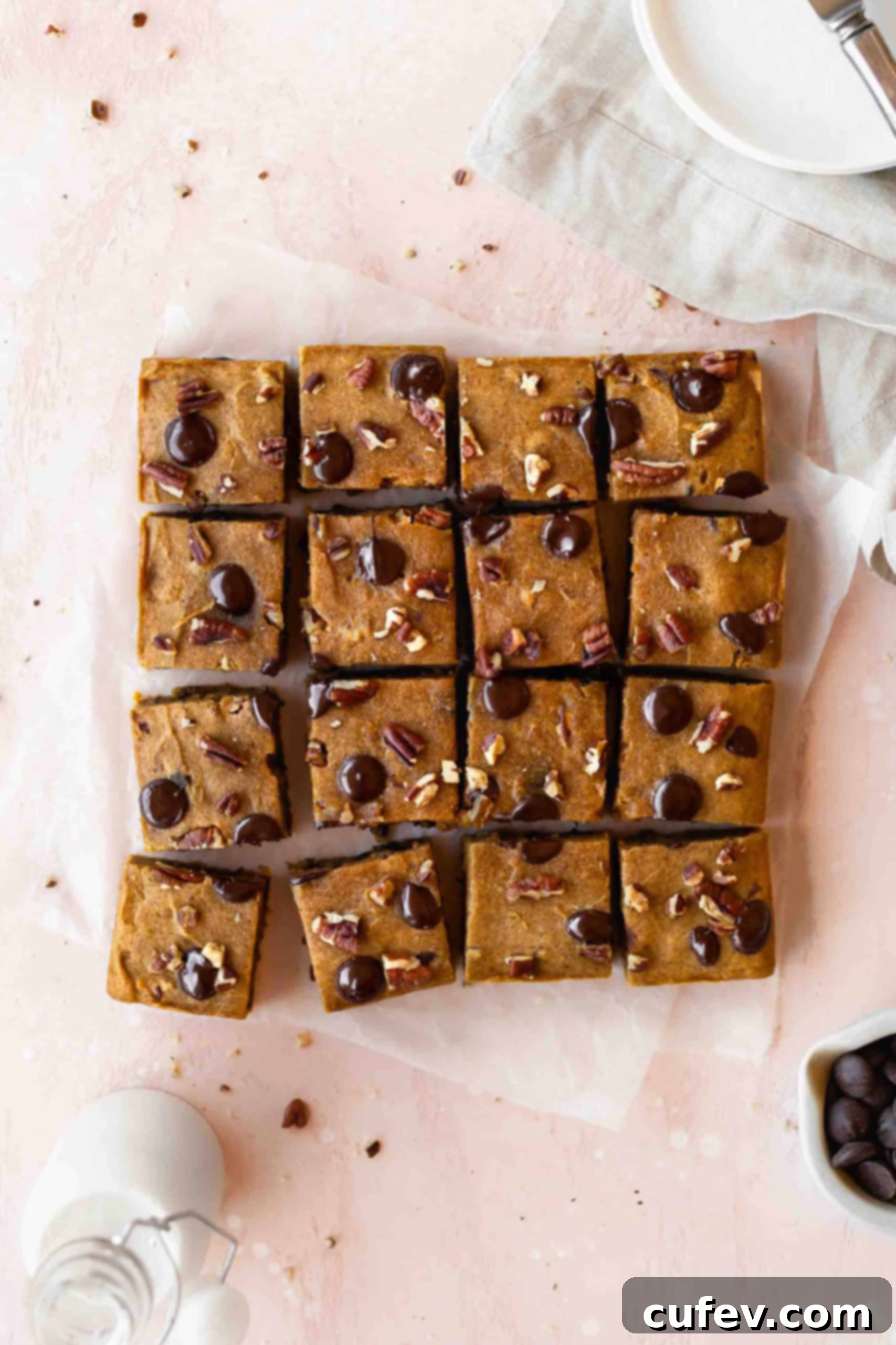 Fudgy pumpkin blondies cut into perfect squares, ready to be enjoyed