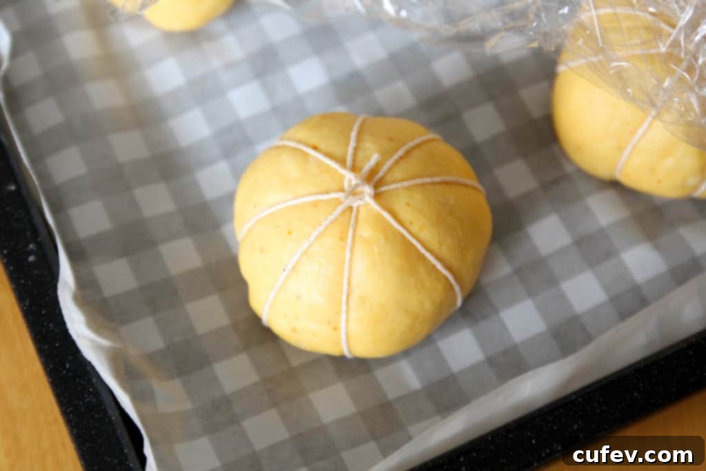 The dough for these soft pumpkin buns is made with canned pumpkin puree, giving them a subtle flavor and beautiful orange hue.