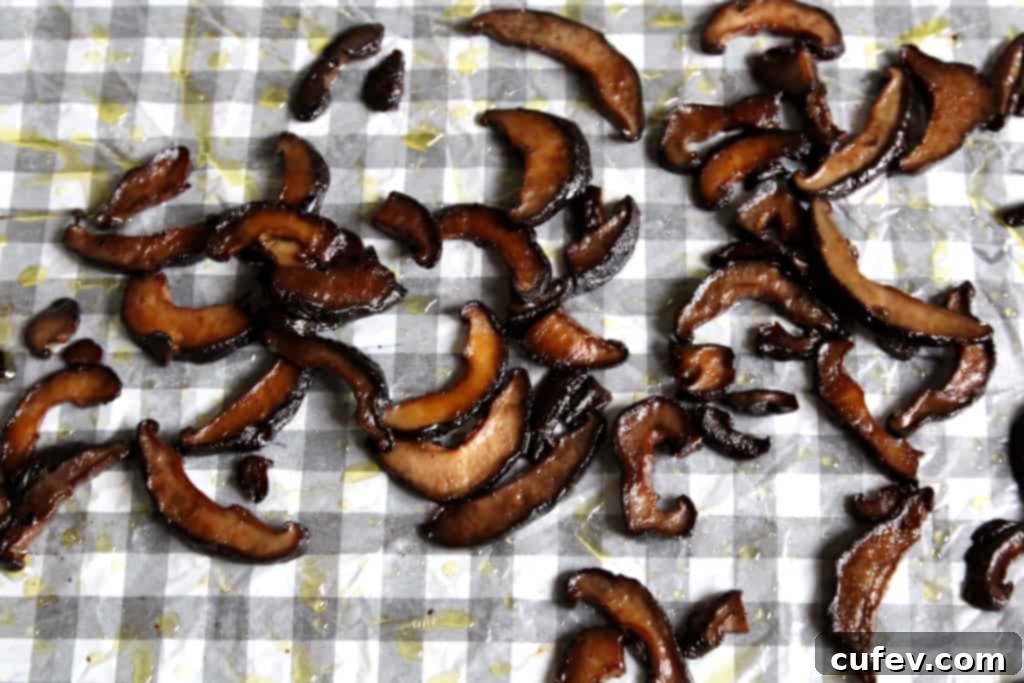 Flavorful marinated shiitake mushrooms, baked to perfection for a delicious vegetarian BLT sandwich filling.