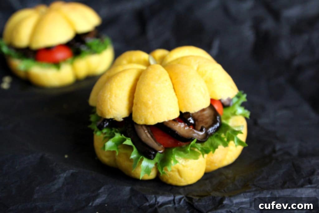 A delicious and festive vegetarian Shiitake BLT sandwich served on a homemade pumpkin bun, perfect for fall celebrations.