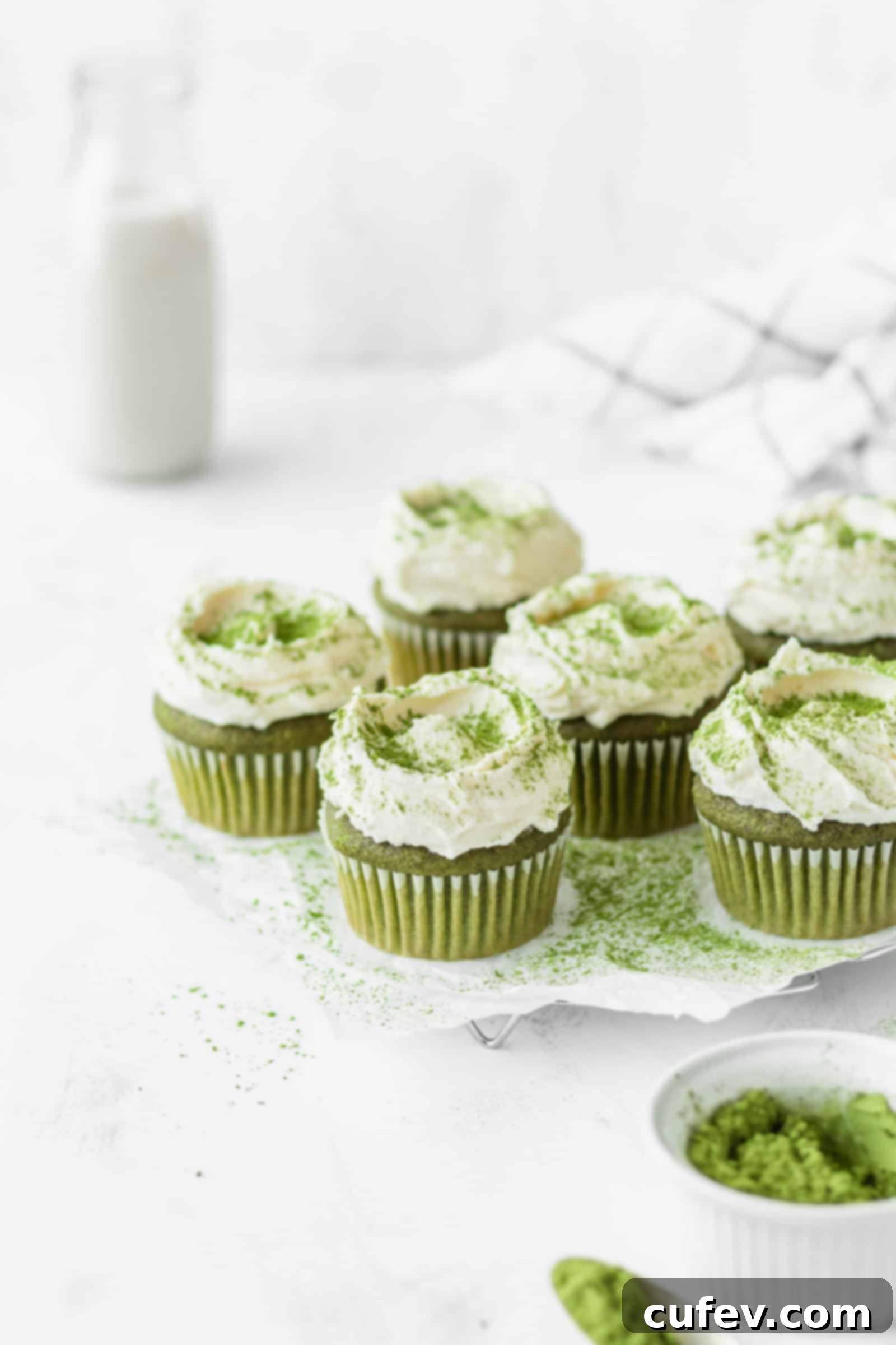 Delicious matcha cupcakes topped with creamy white chocolate cream cheese frosting