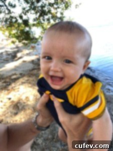 Hugo smiling happily while sitting