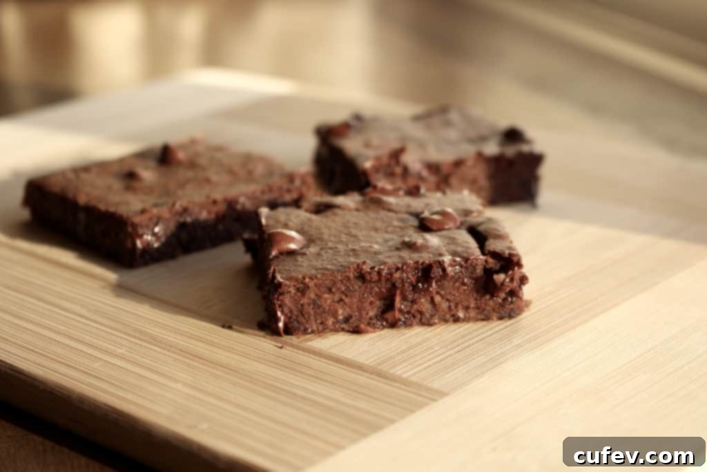 Freshly baked Peppermint Black Bean Brownies cooling in a baking pan