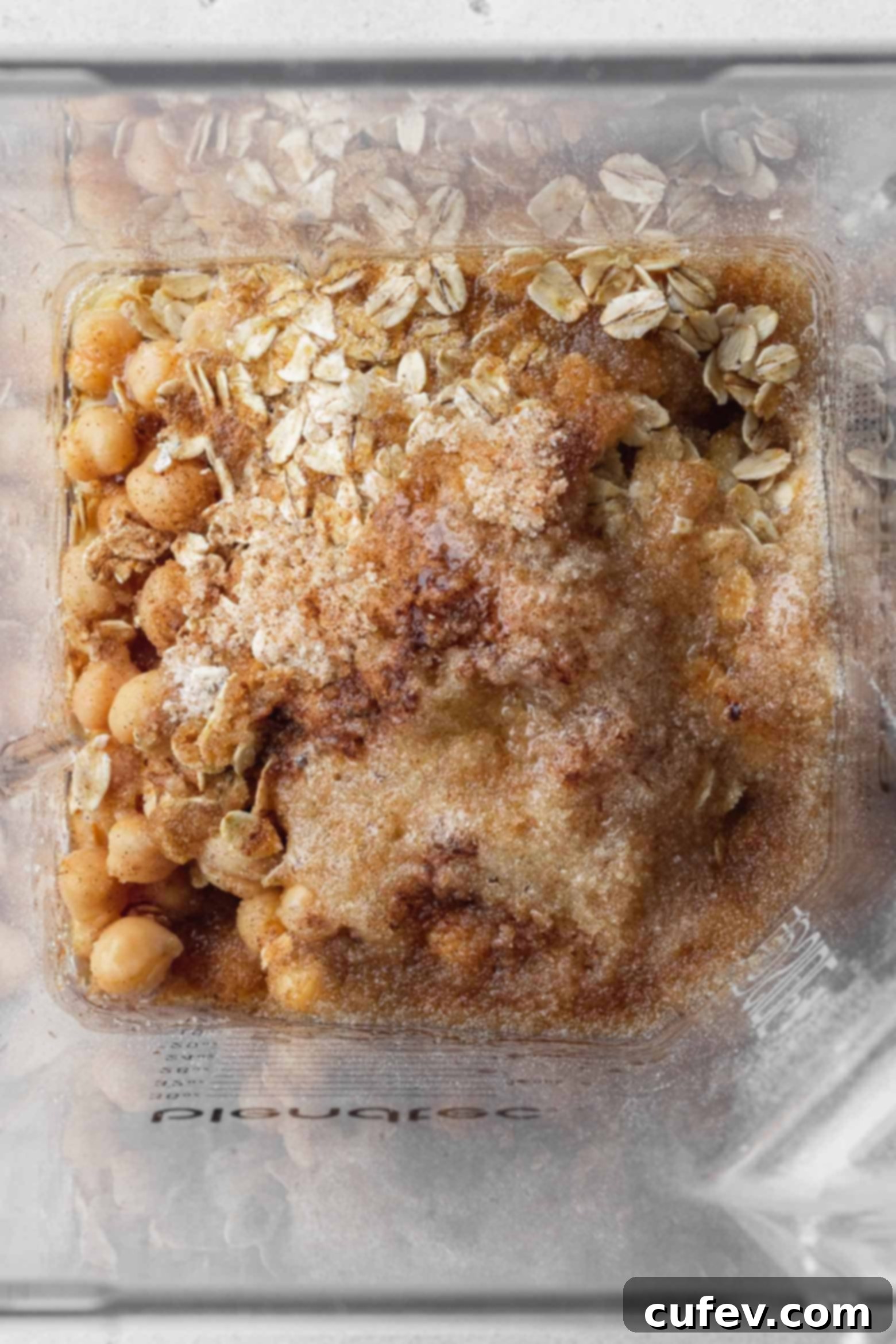 Initial ingredients for chickpea cookies being added to a blender.