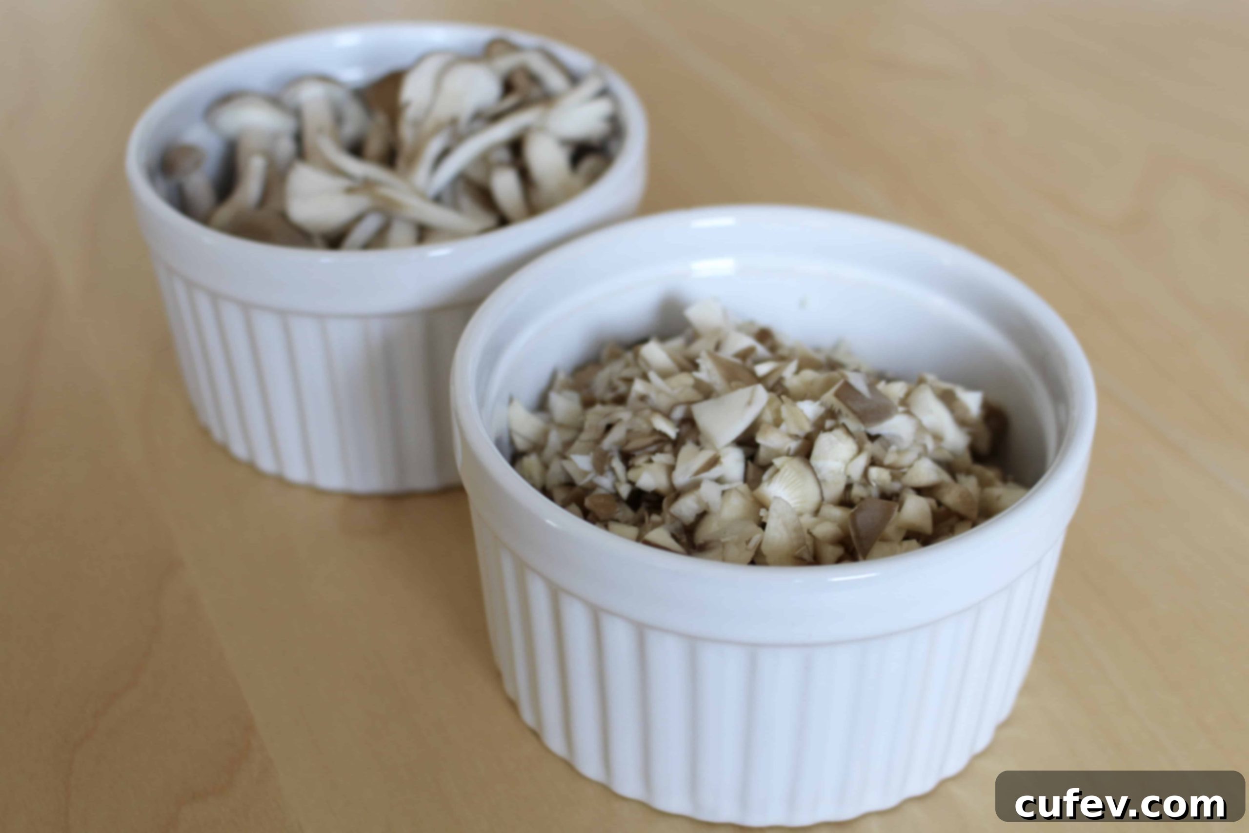 Fresh shimeji and maitake mushrooms in a bowl, ready for preparation