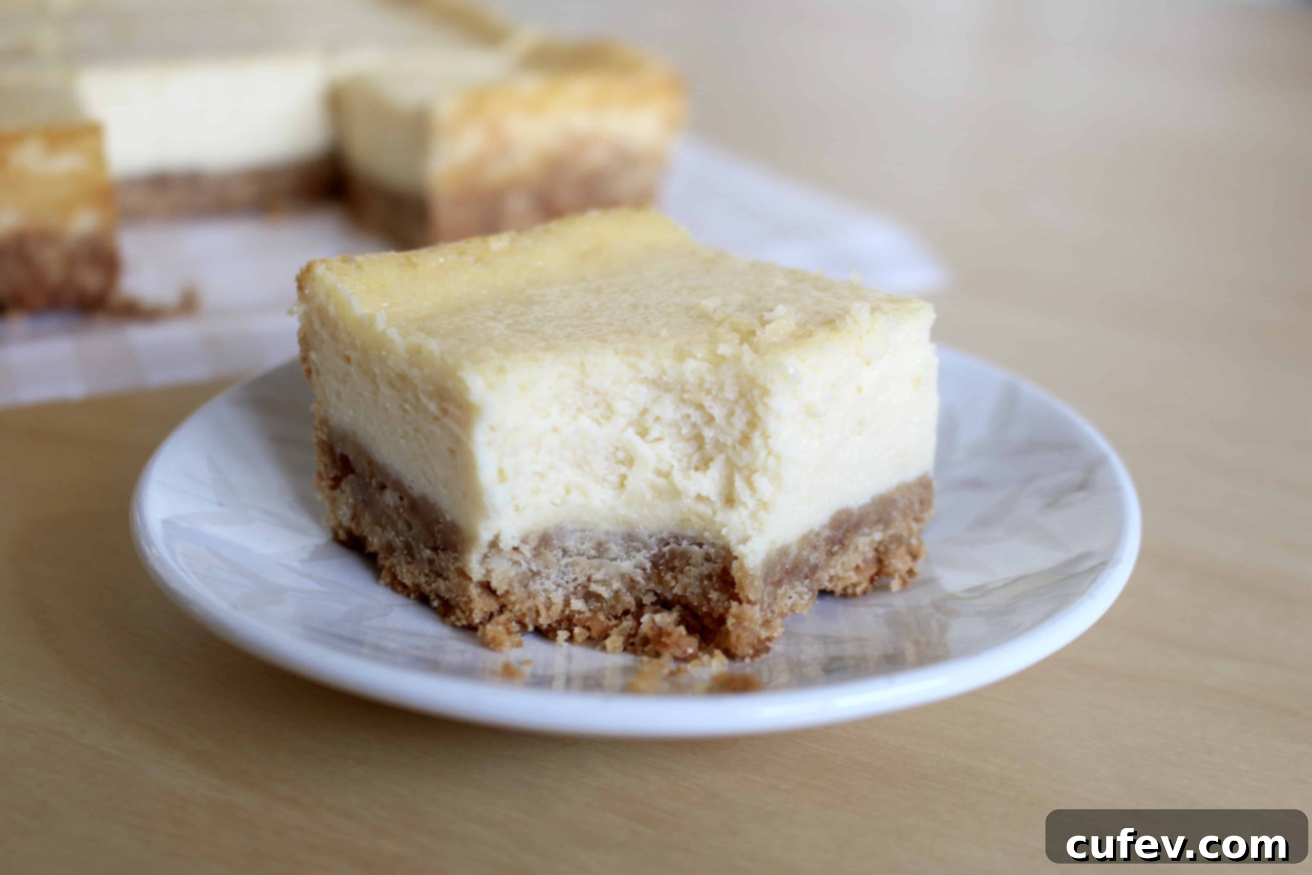 Delightful cheesecake bars with a golden crust