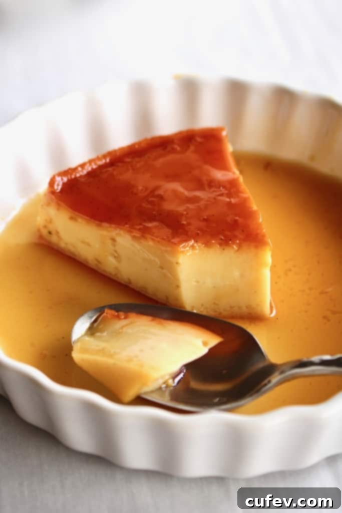 Dairy-Free Filipino Leche Flan 7 A slice of Filipino leche flan with a spoon