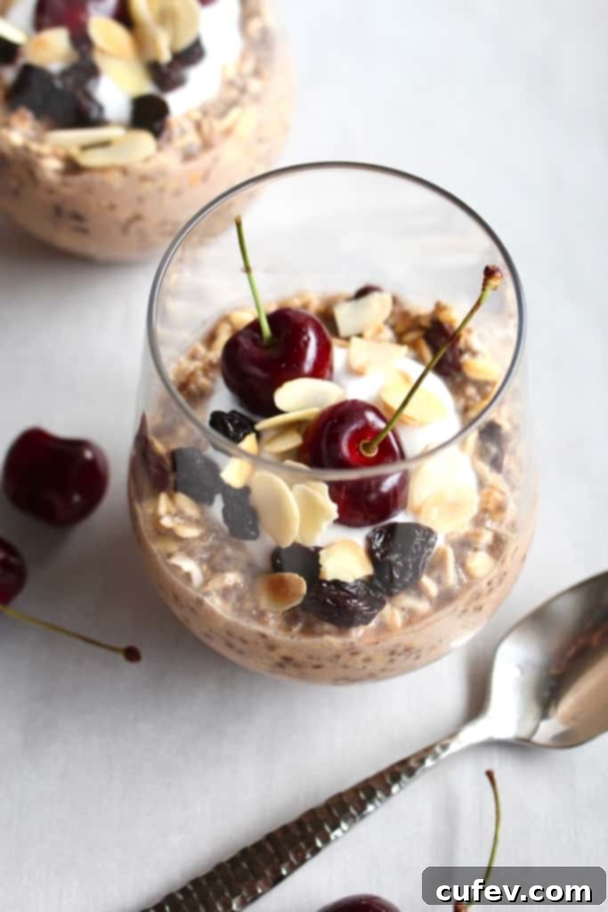 Switch up your oatmeal game by making this overnight oats with tart cherries and almonds! The addition of dried tart cherries brings a refreshing twist to the classic creamy oatmeal breakfast. #overnightoats #oatmeal #cherry #cherries #driedfruit #driedcherries #almond #almondmilk #chiaseeds #chia #organic #fruitbliss #fiber #healthy #weightloss #giveaway #sweepstake #recipe