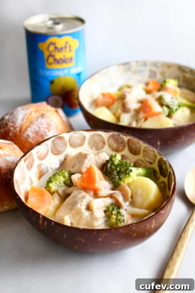 A steaming bowl of Vegan Japanese Cream Stew, rich with vegetables and creamy sauce, served for comfort during fall and winter. Features jackfruit, potatoes, carrots, onions, and broccoli in a coconut milk base.