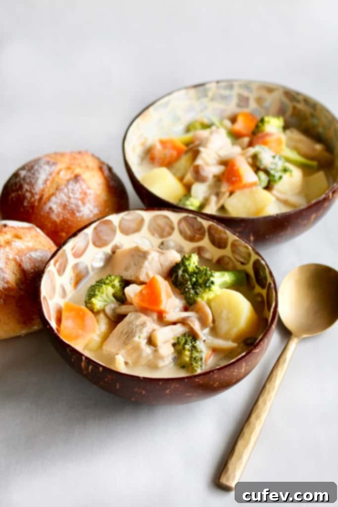 Preparing ingredients for Vegan Japanese Cream Stew, featuring chopped vegetables like onions, carrots, and potatoes, alongside shimeji mushrooms and jackfruit, ready for sautéing.