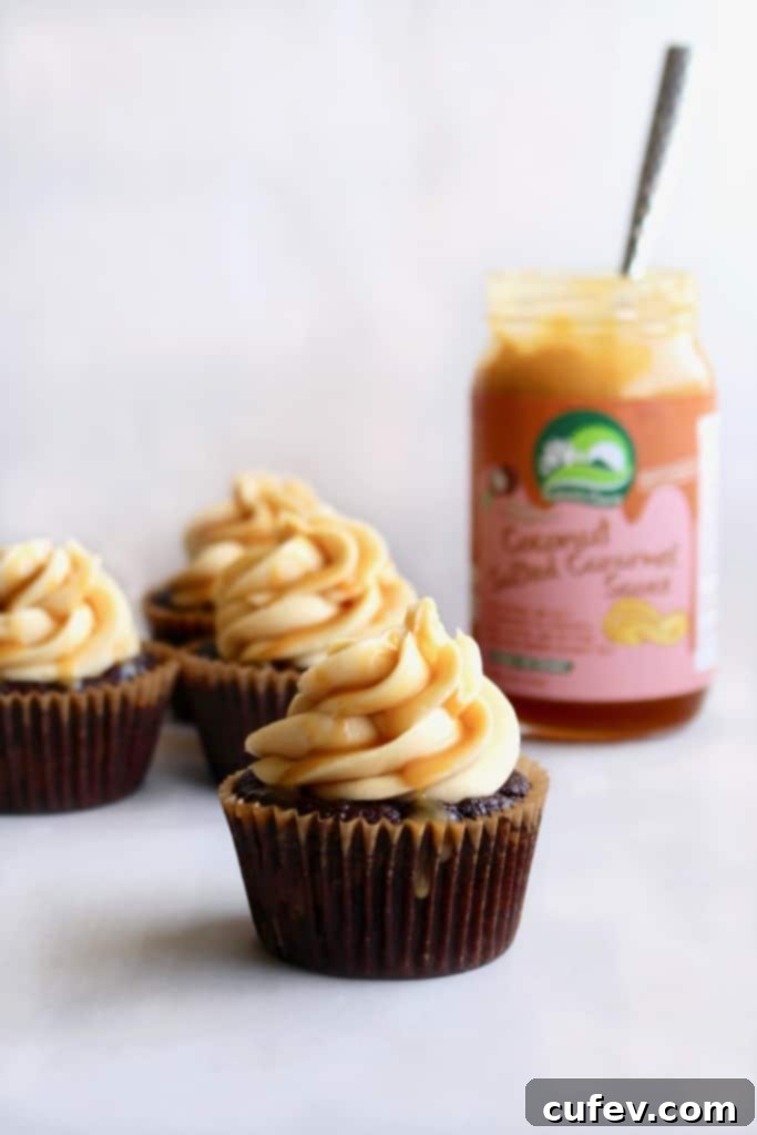 These vegan salted caramel chocolate cupcakes are incredibly moist, filled with coconut salted caramel sauce, and topped with silky salted caramel buttercream. Perfect for any occasion or satisfying a sweet craving, featuring rich chocolate cake and dairy-free caramel.