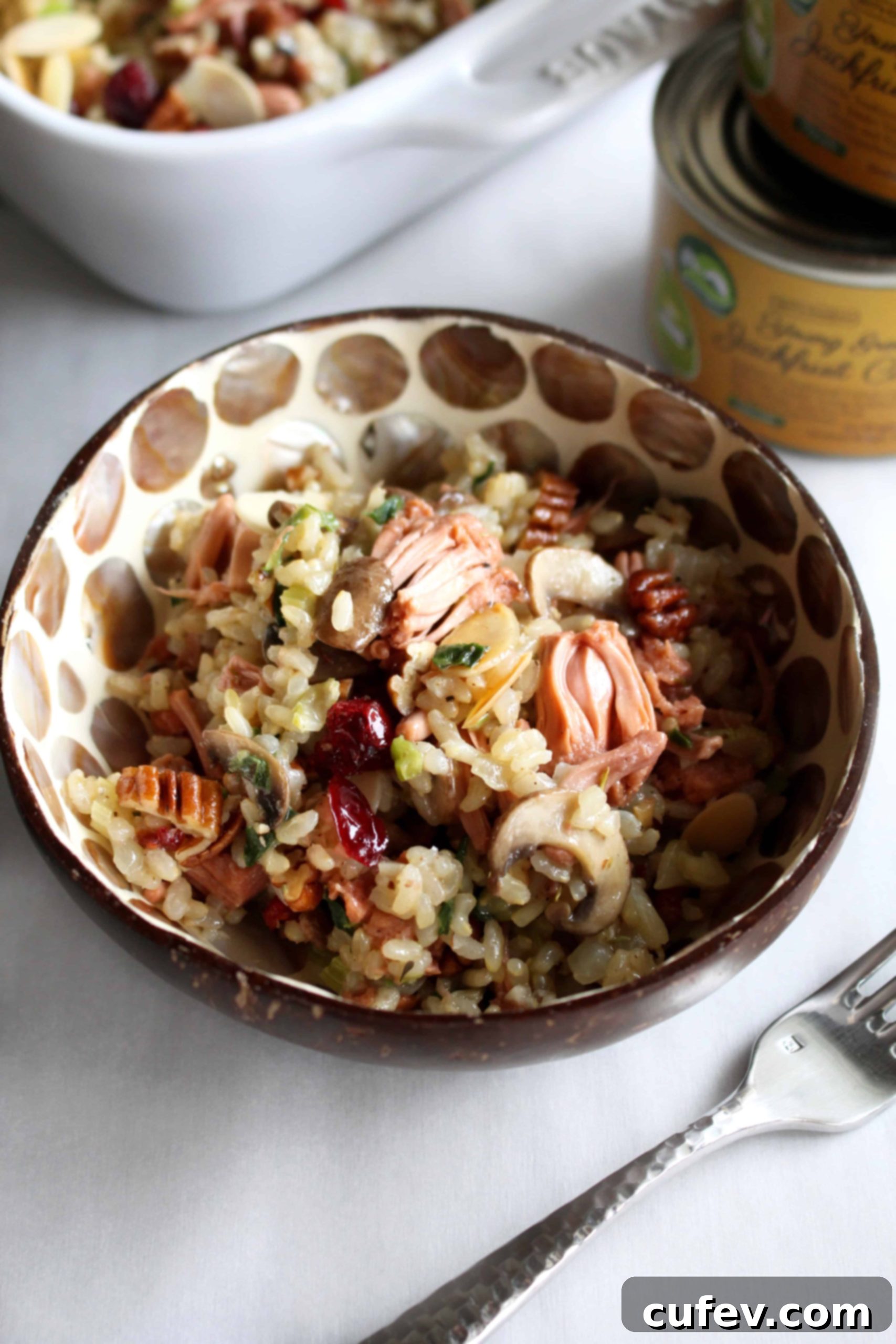 The ultimate vegan and gluten-free holiday stuffing with jackfruit, cranberries, and nuts, showcasing its festive appeal.