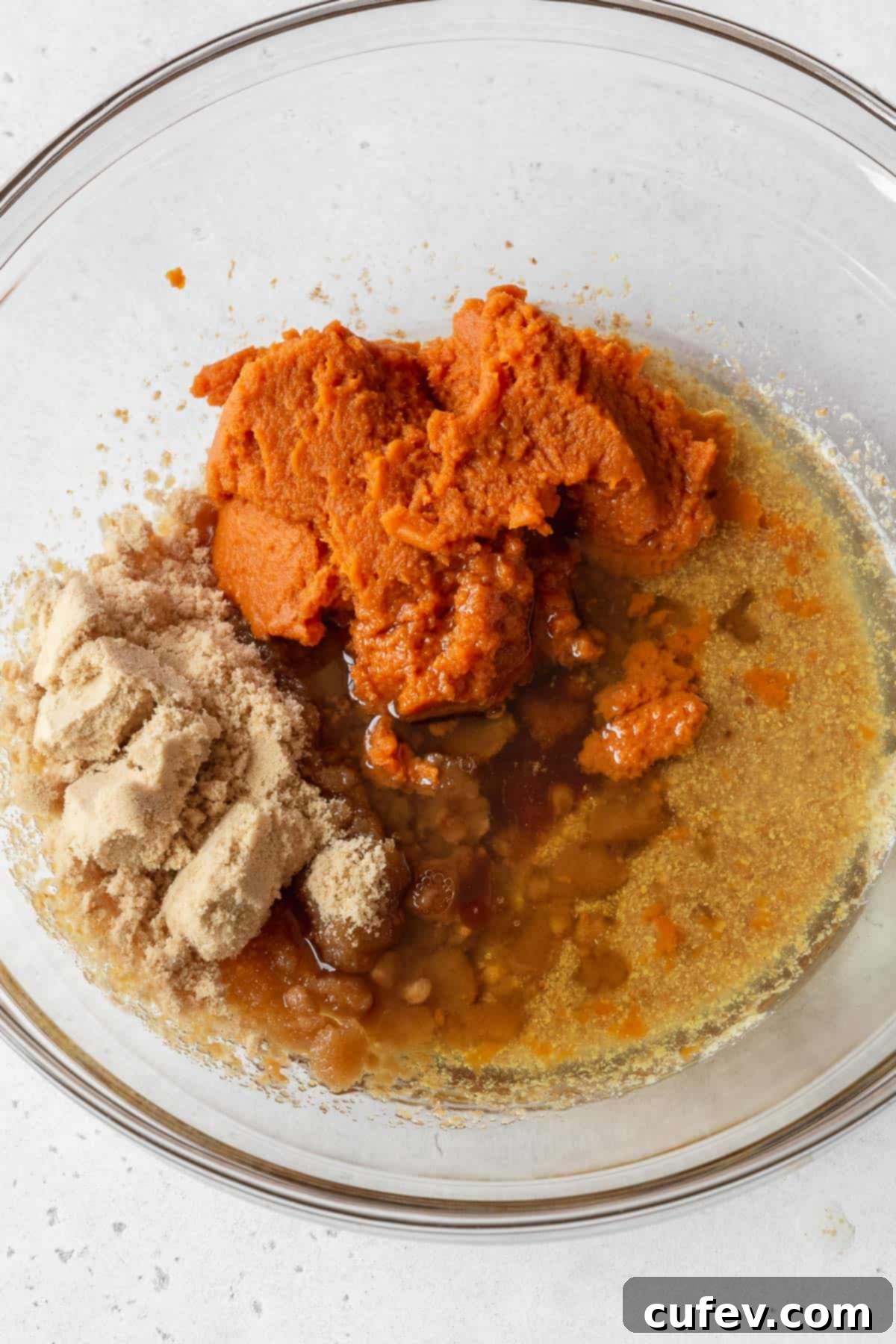 Process shot - wet ingredients and sugar added to bowl with the flax egg.
