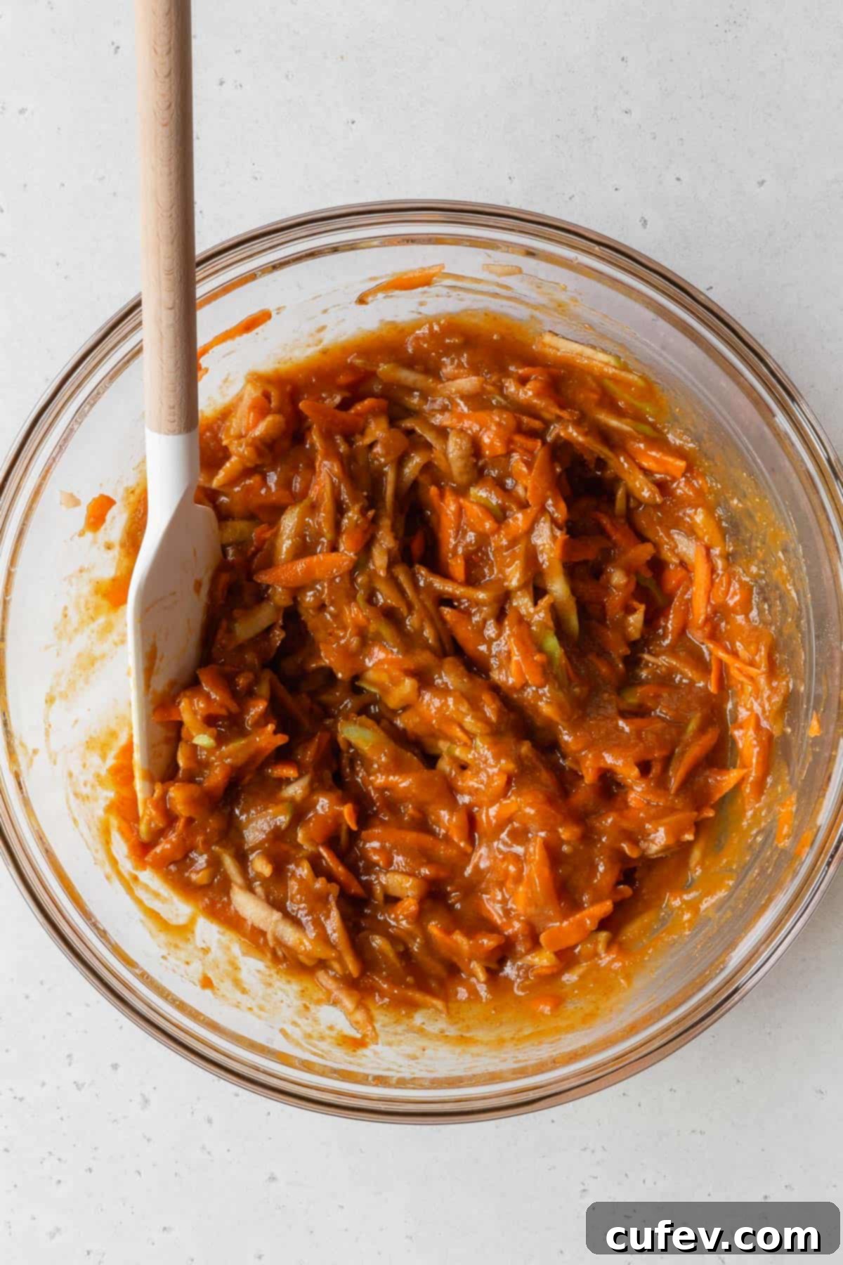 Process shot - morning glory muffin batter after stirring in the carrots and apples.