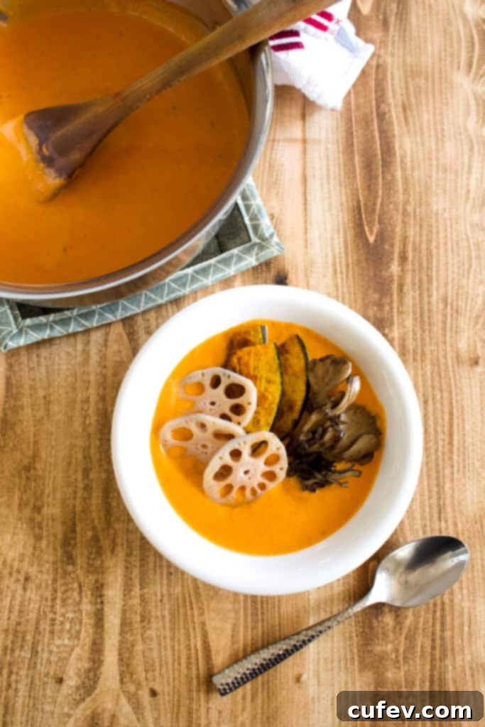 A cooking pot filled with aromatic spices, onions, ginger, and garlic, sautéing to build the flavor base for the vegan coconut curry.