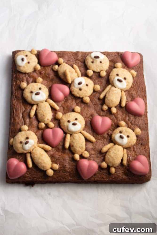 Bear Hug Valentine Brownies 3 If you’re looking for a cute Valentine’s Day treat, look no further! These teddy bear brownies are cakey brownies topped with cookies and ruby chocolate hearts!