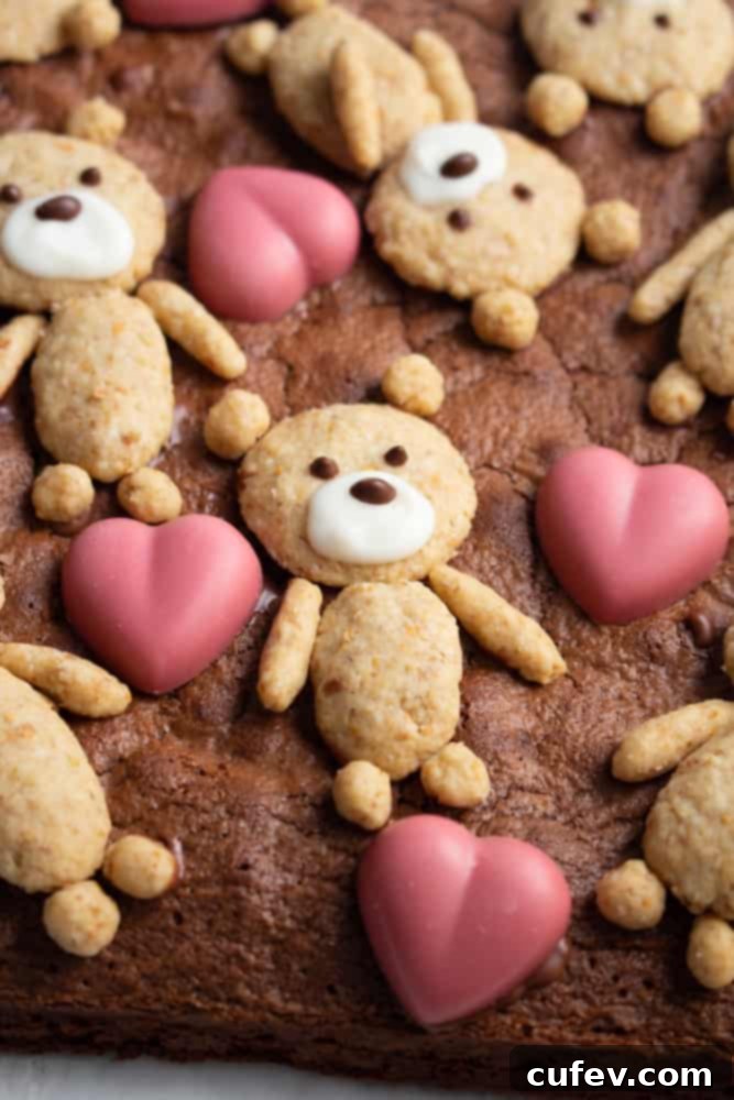 Bear Hug Valentine Brownies 4 If you’re looking for a cute Valentine’s Day treat, look no further! These teddy bear brownies are cakey brownies topped with cookies and ruby chocolate hearts!