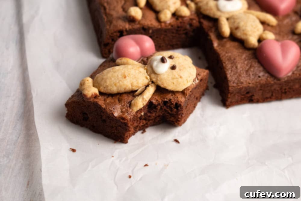 Bear Hug Valentine Brownies 5 If you’re looking for a cute Valentine’s Day treat, look no further! These teddy bear brownies are cakey brownies topped with cookies and ruby chocolate hearts!