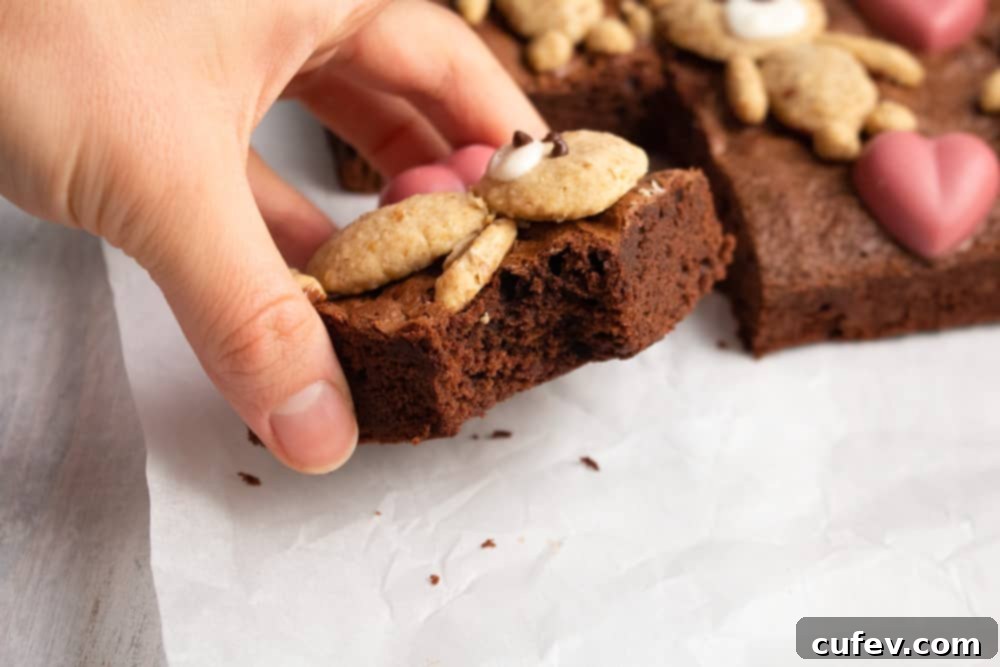 Bear Hug Valentine Brownies 6 If you’re looking for a cute Valentine’s Day treat, look no further! These teddy bear brownies are cakey brownies topped with cookies and ruby chocolate hearts!