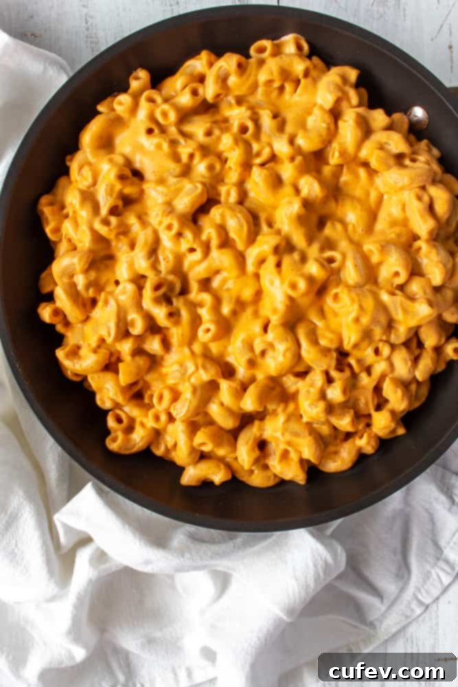 Vegan mac n cheese gets a Thai twist with the addition of spicy red curry paste and zesty tangy lime!