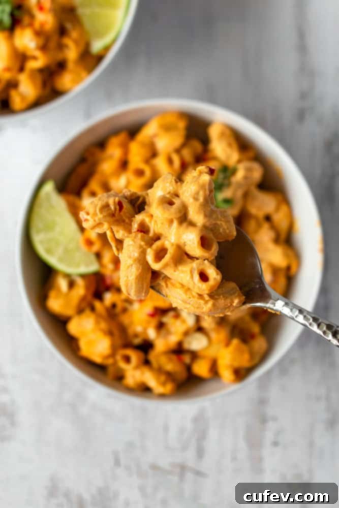 Vegan mac n cheese gets a Thai twist with the addition of spicy red curry paste and zesty tangy lime!