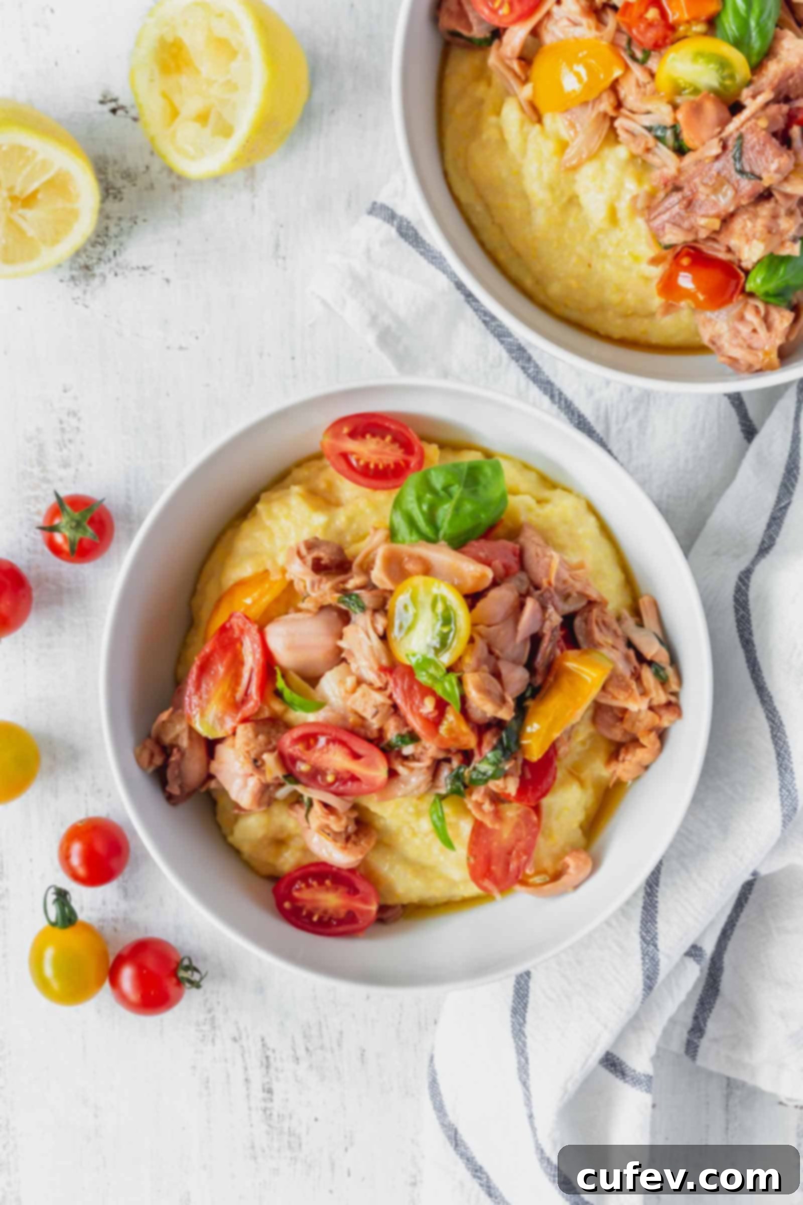 This vegan grits recipe is the perfect gluten-free meal! Creamy vegan polenta cooked in coconut milk is topped with savory jackfruit confit with tomatoes and basil!