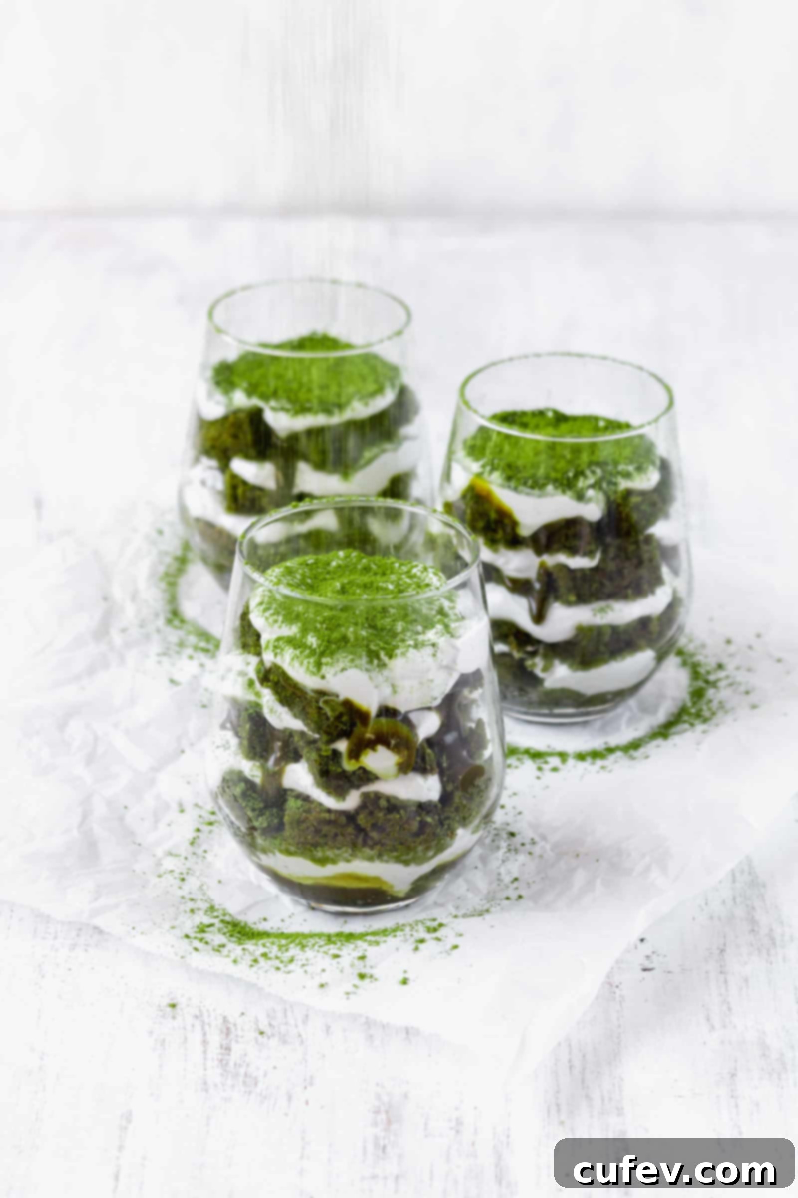 Vegan matcha tiramisu is a Japanese twist on a classic Italian dessert! This recipe has layers of matcha cake, matcha sauce, and coconut whipped cream! #matchadessert #vegantiramisu #matchatiramisu #vegandessert #coconutwhippedcream