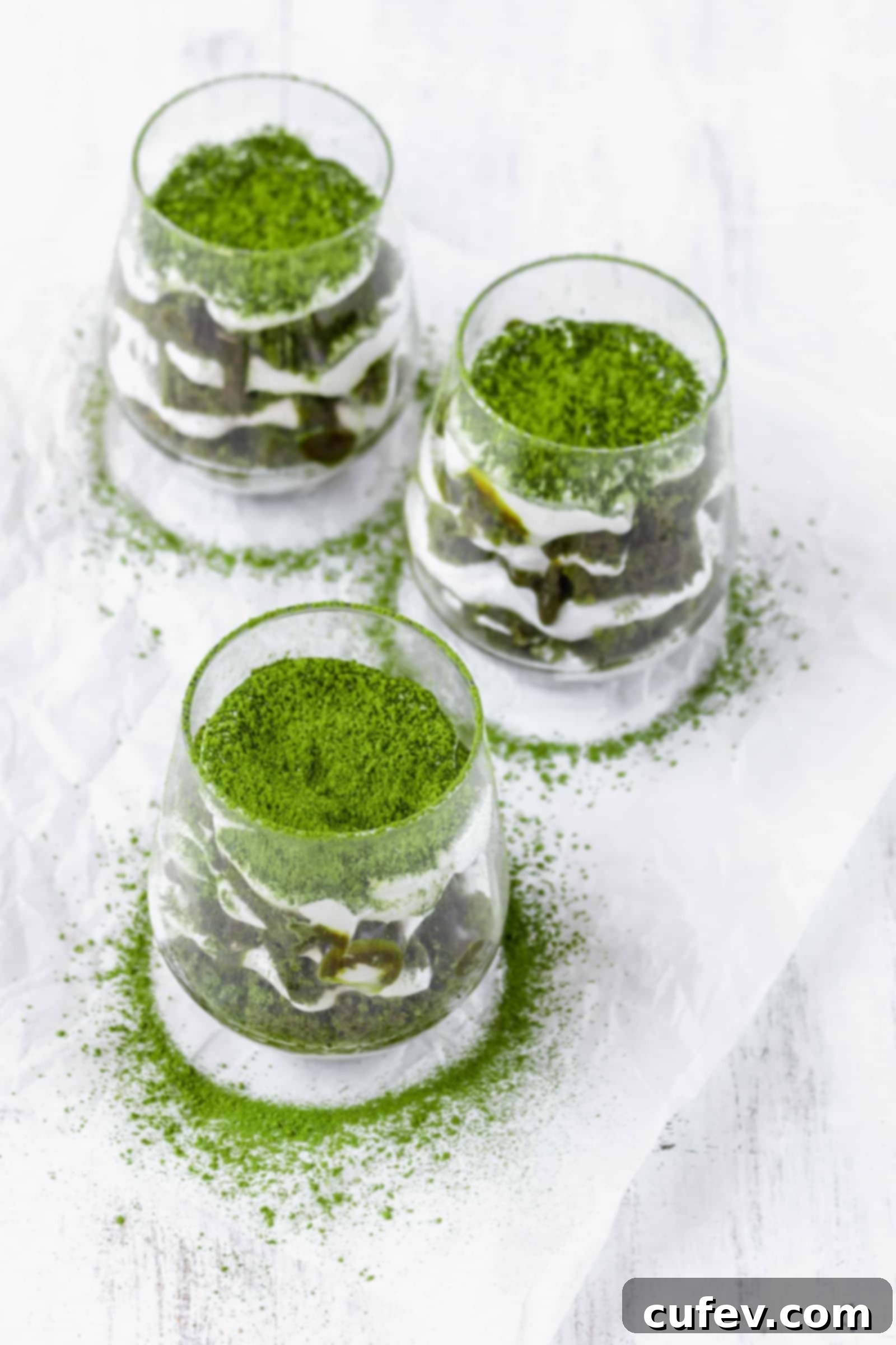 Vegan matcha tiramisu is a Japanese twist on a classic Italian dessert! This recipe has layers of matcha cake, matcha sauce, and coconut whipped cream! #matchadessert #vegantiramisu #matchatiramisu #vegandessert #coconutwhippedcream