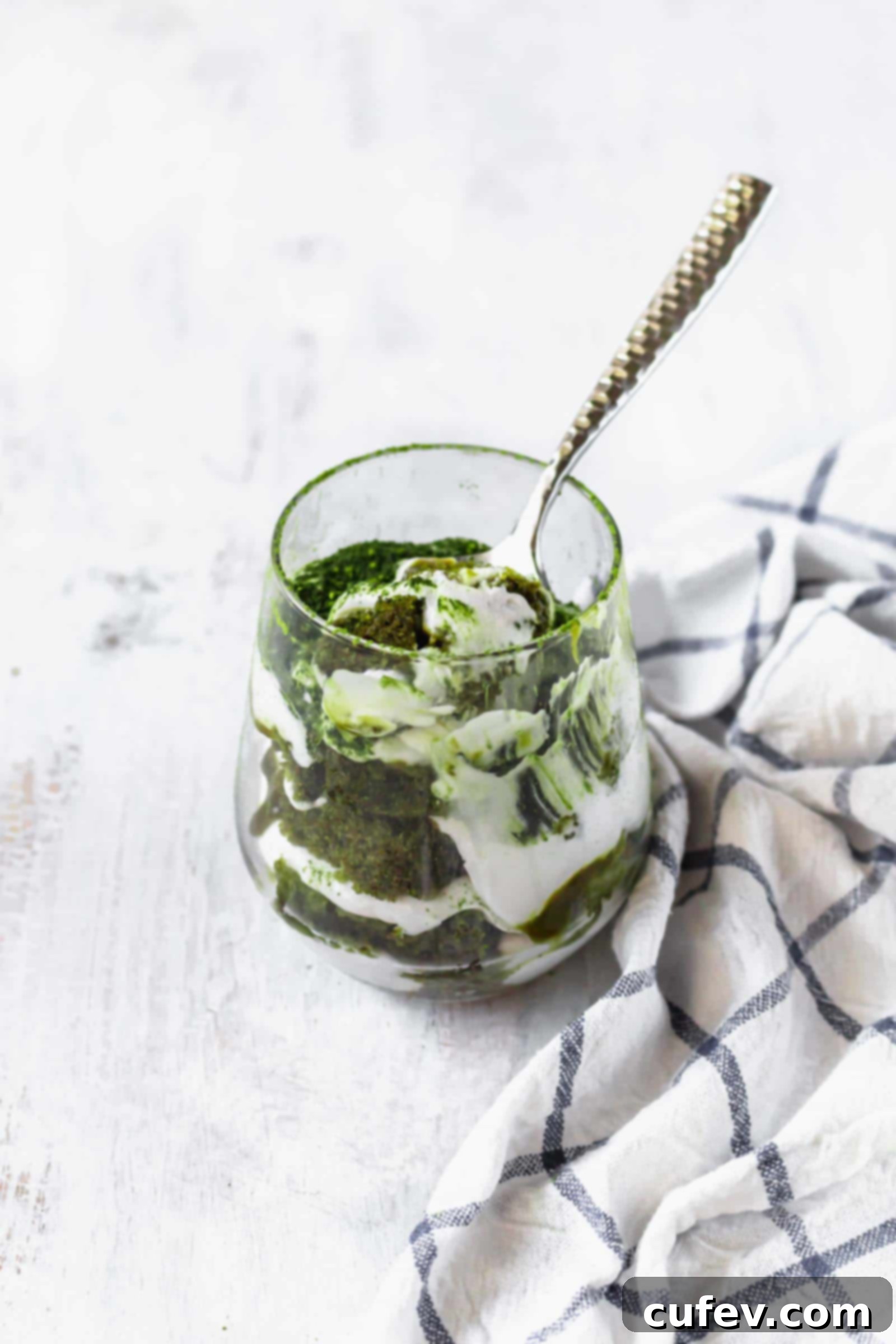 Vegan matcha tiramisu is a Japanese twist on a classic Italian dessert! This recipe has layers of matcha cake, matcha sauce, and coconut whipped cream! #matchadessert #vegantiramisu #matchatiramisu #vegandessert #coconutwhippedcream